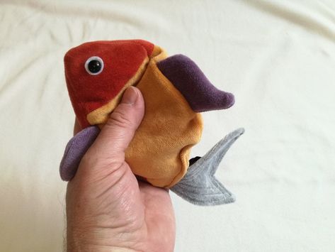 This is my cute Lil' Fish Beansack, the soft toy which is really popular in Budapest gift shops and at artisan markets where I sell it. This is not a soft stuffed animal but a beansack. You can fill it with rice or any other small grain or PE granulates, as I do. Now you can buy the sewing pattern and guide so you can make your own fish! It is simple to make, even if you are a beginner. The sewing pattern is downloadable, no additional cost or delay. Buy your pattern and start making your own fi Diy Fish Stuffed Animal, Sewing Machine Stuffed Animals, Lizard Stuffed Animal Pattern, Goldfish Sewing Pattern, Sewing Project Inspiration, Cute Stuffed Animal Patterns, Fish Stuffed Animal Pattern, Patchwork Stuffed Animal Patterns Free, Simple Sewing Ideas For Beginners