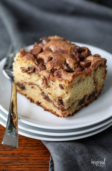 Learn how to make these easy Chocolate Chip Cake recipe, perfect for any home baker. Made with simple ingredients like sour cream for extra moisture and loads of rich milk chocolate chips, it's a delightful treat for family gatherings or a cozy night in. Dive into this moist, delicious cake that promises to be a hit! Easy Chocolate Chip Cake, Cake With Chocolate Chips, Chocolate Chip Cake Recipe, Cake Cinnamon, Creative Dessert Recipes, Chocolate Chip Cake, Creative Desserts, Favorite Dessert Recipes, Spice Cake