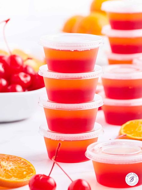 These Tequila Sunrise Jello Shots mimic the beautifully layered classic Tequila Sunrise Cocktail for a fun and delicious party treat! Made with the flavors of a tequila sunrise drink like tequila, grenadine, lemon-lime soda, and cherry and orange jello (in lieu of the juices), they're so delicious! Jello Shots With Tequila, Shots With Tequila, Mojito Jello Shots, Tequila Jello Shots, Thanksgiving Jello, Best Jello Shots, Jello Shots Vodka, Pineapple Jello, Halloween Jello Shots