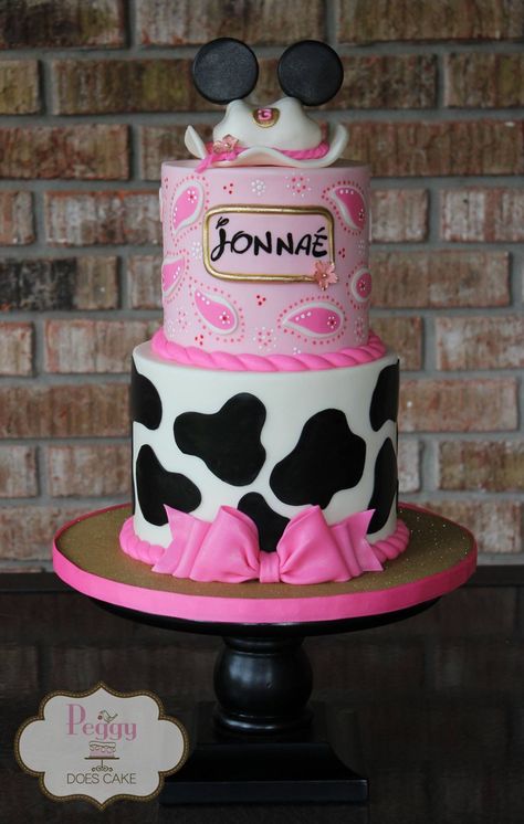 Western Minnie Mouse cake with hand-painted paisley! #cowgirlMinniecake #countryMinniecake #minniecake #cowgirlcake #westerncake #westernminniecake #countrygirlcake #pinkwesterncake #westerngirlcake #countrygirlcake #cowgirlpinkcake #peggydoescake Cowgirl 2nd Birthday Cake, Farm Birthday Cakes, Cowgirl Cakes, Peggy Lee, Minnie Mouse Birthday Decorations, Farm Themed Party, Barnyard Birthday Party, Red Wedding Theme, Cowboy Birthday Party