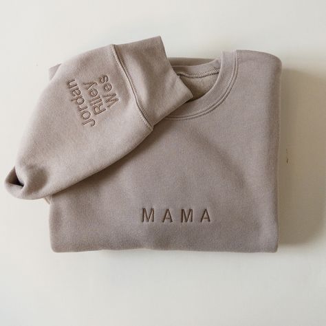 MAMA, DAD, AUNTIE, UNCLE, GRANDMA, GRANDPA custom embroidered crewneck sweatshirt, monochromic and neutral minimal modern design. This sweatshirt is unisex in size so fits slightly oversized. Material is lightweight and buttery soft fleece lined, perfect for year-round!  NEW OPTION to add sleeve embroidery! sleeve embroidery will be in same font and color as front chest design unless otherwise noted.  maximum of 3 names per sleeve!  Bella + Canvas Fleece  material: Airlume Combed and Ring-spun c Gifts For New Grandparents, Minimal Modern Design, Chest Design, Sleeve Embroidery, Name Embroidery, Embroidered Crewneck, Presents For Mom, Mama Sweatshirt, Custom Sweatshirts