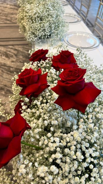 Luxury Wedding Flowers, Styling & Decor on Instagram: "Timeless Beauty🌹 Watch us create a top table worth talking about. Draping clouds of gypsophila and reflexed red roses are the perfect way to create a romantic setting on your big day. Our 2024 and 2025 diary is filling up fast. Contact us today to avoid disappointment. #CameronHouseWedding #LochLomondWedding #WeddingFloristGlasgow #WeddingDecor #WeddingFloristAyrshire #WeddingDesign #WeddingInspo" Roses On Table, Red Rose Decor, Black Setup, Rose Centerpieces Wedding, Red Roses Wedding, 2025 Diary, Luxury Wedding Flowers, Nikah Decor, To Avoid Disappointment