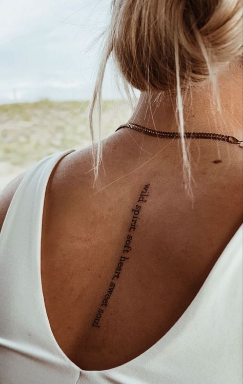 Spine Tattoos For Women Lyrics, Female Spine Tattoos Quotes, Wording Spine Tattoo, Woman Spine Tattoo Ideas, This Too Shall Pass Quote Tattoo Spine, Script Tattoo Spine, Sister Spine Tattoos, Script Spine Tattoos For Women, Boho Spine Tattoo