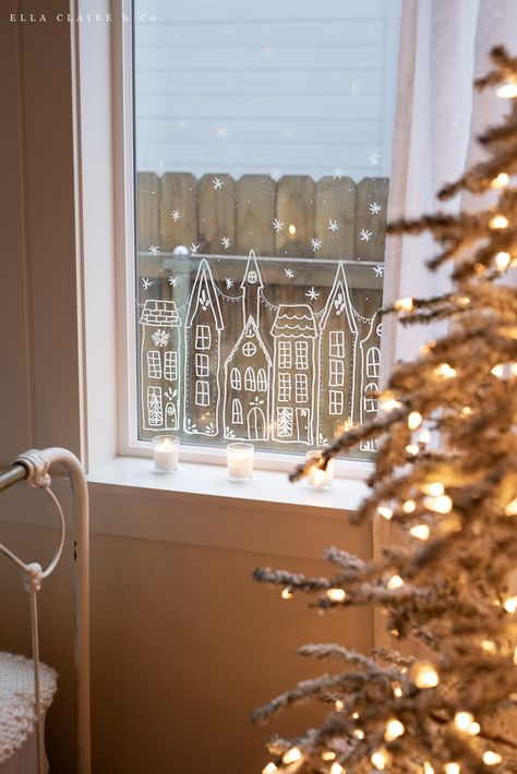 Create a beautiful European Christmas village in your window with this free printable stencil. Simply print and trace houses in your window for a charming holiday decoration that will last all winter long. Christmas House Window Display, Christmas Tree By Window, Free Printable Christmas Village Window Stencil, White Chalk Christmas Window, Printable Christmas Village Houses, Snowflakes In Windows, Christmas Village Window Stencil, Edding Uk Templates Christmas Window, Christmas Village Window Template