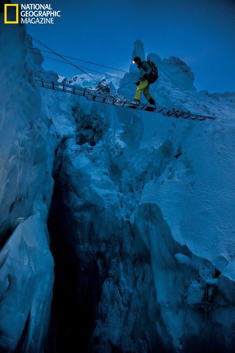 A bridge of aluminum ladders lashed together above a crevasse in the Khumbu Icefall Extreme Sports Photography, Extreme Photography, Climbing Everest, Monte Everest, Extreme Adventure, Ice Cave, National Geographic Magazine, Ice Climbing, Burton Snowboards