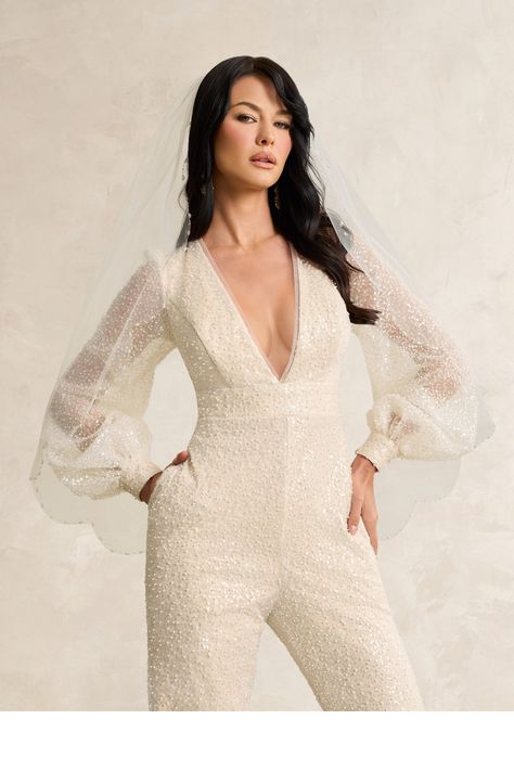 Make a bold and modern statement in Virginia, our sparkly wedding jumpsuit. Cut from our beaded tulle fabric, she features a stunning pleated V neckline and full length bishop sleeves. Elopement Jumpsuit, Bridal Jumpsuit The Bride, Wedding Pantsuit The Bride, Androgynous Wedding Attire, Wedding Jumpsuit The Bride, Glamorous Wedding Dress, Wedding Dress Jumpsuit, Wedding Dress Beaded, Wedding Reception Outfit