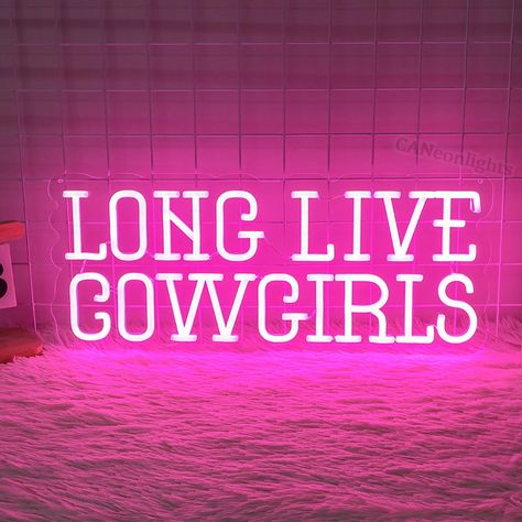 Saddle up and celebrate the spirit of the wild west with our "Long Live Cowgirls" Neon Sign! This custom LED light is the perfect gift for cowgirl lovers and adds a touch of western charm to any space. Whether you're hosting a cowboy party or simply want to adorn your ranch walls with stylish decor, this cowgirl-inspired neon sign is sure to make a statement. Let the frontier spirit shine bright with this unique piece of cowgirl wall art that pays homage to the fearless women of the west! What i Long Live Cowgirls Neon Sign, Neon Party Sign, Room Ideas Western Aesthetic, Pink Cowgirl Home Decor, Cowgirl Theme Room, Cowgirl Neon Sign, Boho Cowgirl Bedroom, Neon Cowgirl Aesthetic, Pink Cowgirl Room