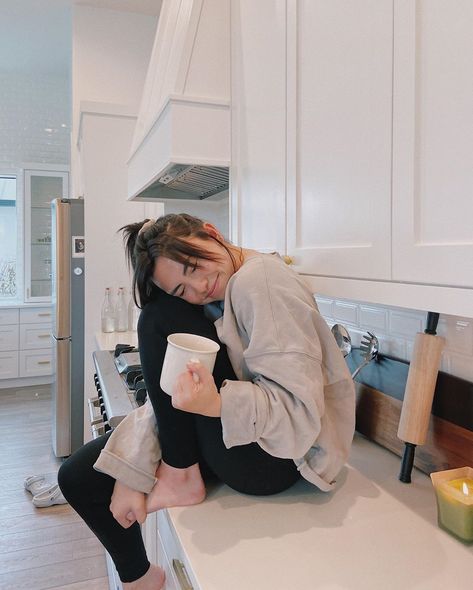 Haley Pham on Instagram: “yes yes I was caught just casually sitting on my kitchen counter drinking out of my mug and smiling at the ground and I definitely am not…” Haley Pham, Cozy Coffee, Instagram Photo Inspiration, Insta Inspo, Instagram Inspo, Shoot Ideas, My Kitchen, Kitchen Counter, Photoshoot Ideas