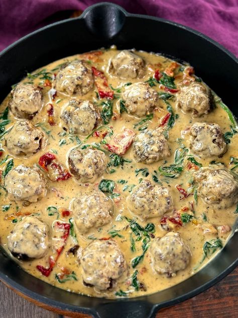 These tender, flavorful meatballs are cooked in a creamy, savory sauce with Parmesan cheese, sun-dried tomatoes, garlic, and herbs, creating a dish so delicious, it might just inspire a marriage proposal! Perfect for cozy nights in or special occasions, Marry Me Meatballs can be made with your choice of chicken, beef, or pork, allowing you to customize the flavor to suit your taste. Marry Me Meatballs, Flavorful Meatballs, Cast Iron Skillet Recipes, Beef Meatballs, Louisiana Recipes, Homemade Meatballs, Cookout Food, Soup Dinner, Savory Sauce