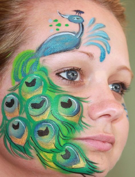 I like the tail draping down the face. Peacock Face Painting, Peacock Makeup, Mime Face Paint, Animal Face Paintings, Christmas Face Painting, Face Painting Easy, Face Paint Makeup, Kids Face Paint, Body Suit Tattoo