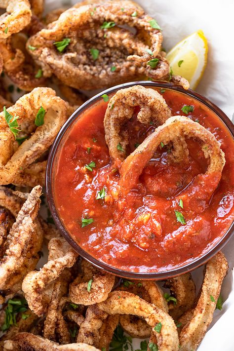 Hot and crispy, this fried calamari is a delicious take on a restaurant favorite, and comes complete with spicy marinara for dipping! | thecozyapron.com #friedcalamari #friedcalamarirecipe #friedcalamarirecipeeasy #friedcalamarisauce #friedcalamarieasy Calamari Sauce, Spicy Marinara Sauce, Calamari Recipes, Marinara Recipe, Yummy Healthy Breakfast, Fried Calamari, Dipping Sauces Recipes, Food Stamps, Calamari