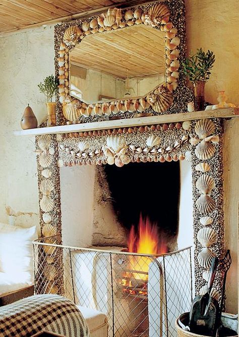 These 9 stunning shell mosaic fireplace mantel ideas are labor of love projects for sure. Featured on Completely Coastal. Just imagine how nice it will be to enjoy your hand collected shells from long stroll along beaches on your fireplace mantel! Cozy Cottage Living Room, Mosaic Fireplace, Seashell Mosaic, Cheap Office Decor, Cottage Interior Design, Living Room Fireplace, Cottage Living Room, Small Cottages, Shell Mosaic