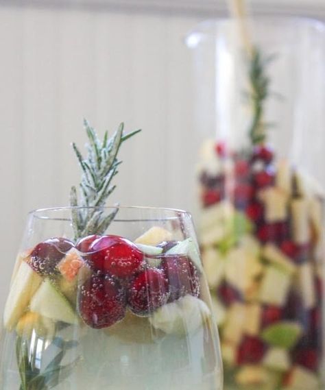 Cranberry & Rosemary White "Christmas" Sangria Recipe White Christmas Sangria, Christmas Sangria, White Sangria, Holiday Cocktail Party, Christmas Cocktails, Holiday Cocktails, Ginger Ale, Holiday Drinks, Wrapping Ideas