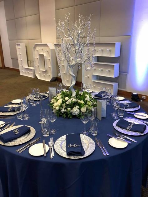 Navy Wedding Reception, Fresh Flower Centerpieces, Silver Wedding Reception, Blue Table Decorations, Silver Wedding Centerpieces, Silver Wedding Theme, Blue Silver Weddings, Blue Table Settings, Navy Table