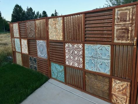 metal ceiling tile fence ~ I would make the corrugated roofing/fencing follow a zia pattern... Upcycled Fence, Cheap Privacy Fence, Antique Tin Ceiling Tile, Corrugated Metal Fence, Fence Planning, Privacy Fence Designs, Pallet Fence, Backyard Privacy, Steel Fence