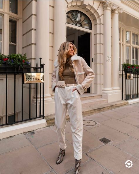 London street style sprint look. White leather trousers with khaki knit top and heeled snake boots 💚 http://liketk.it/3927F @liketoknow.it #liketkit Leather Trousers Outfit Winter, Trousers Outfit Winter, Leather Trousers Outfit, Snake Boots, Trousers Outfit, London Street Style, London Street, Leather Trousers, White Leather