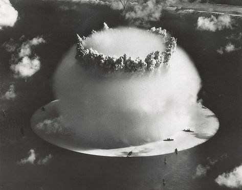 Shot "Baker" of Operation Crossroads (1946) was the first underwater nuclear explosion, a 21 kiloton underwater nuclear weapons effects test by the US at Bikini Atoll in 1946.  The seawater ejected by this test was highly radioactive and seriously contaminated many of the US Navy ships deployed in the test zone.  Those ships which could not be decontaminated were sunk by the US Navy off the coast of San Francisco. Nuclear Explosion, Operation Barbarossa, Mushroom Cloud, Nuclear Test, Rare Historical Photos, Marshall Islands, Atomic Age, Nuclear Power, Hiroshima