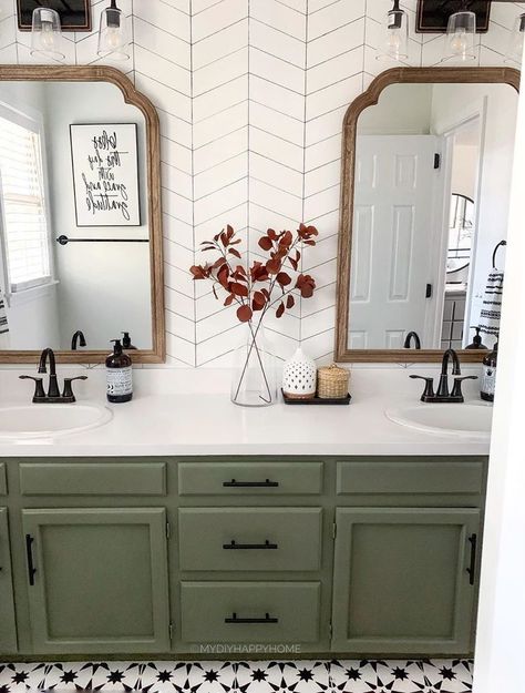 From couches to cabinets, green seems to be everywhere this year—but there’s still nothing quite like the queenly of-the-moment vibes of these sage-green cabinets from @mydiyhappyhome. “Sage-green cabinetry has been trending in kitchens for a couple years now and has finally found its way into the bathroom,” says Dudley. “Sage green feels fresh, organic, and inviting. It also looks great with brass or matte-black hardware.” Trending Home Decor, Bad Inspiration, Green Cabinets, Bathroom Trends, Upstairs Bathrooms, Bathroom Redo, House Bathroom, Bathroom Remodel Master, Black Hardware