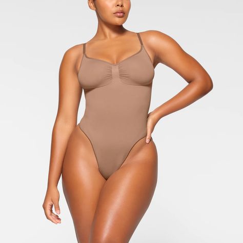 This Tummy Control Bodysuit is a perfect dupe for the Skims Seamless Sculpt Bodysuit. Made with 80% Nylon, 20% Spandex (The Skims Bodysuit is made with 78% Nylon / 22% Spandex) Snatches you in perfectly and comes in many different colors! Sculpting Bodysuit, Bodysuit Designs, Shapewear Bodysuit, Popular Outfits, Body Suit, Polished Look, Clothing Company, Luxury Fabrics, Kim Kardashian