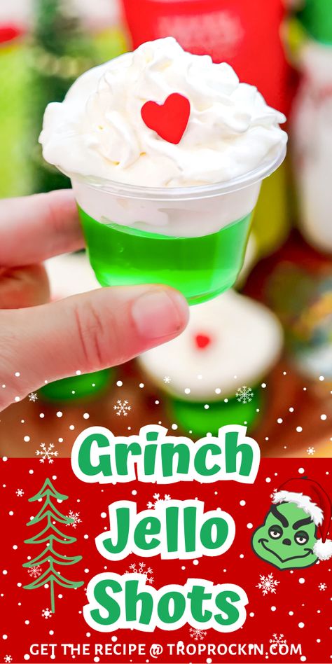 Grinch jello shots are green with whipped cream on top and a heart sprinkle. Perfect for christmas jello shots. Christmas Jell O Shots Holiday Parties, Themed Jello Shots, Grinch Jello Shots, Heart Jello, Grinch Jello, Holiday Jello Shots, Fun Christmas Cocktails, Easy Jello Shots, Grinch Drink