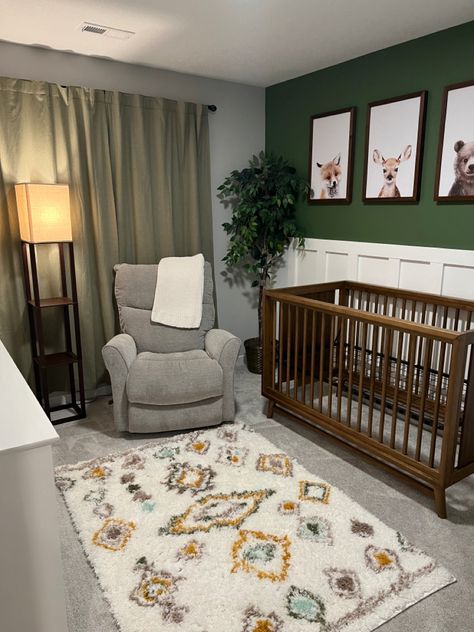 Nursery Ideas With Brown Crib, Woodland Nursery White Crib, Nursery Ideas With Dark Wood Crib, Forest Green And Grey Nursery Boy, Green Gray Brown Nursery, Green Nursery Brown Crib, Dark Green Crib Nursery, Green Nursery With Brown Furniture, Woodland Nursery Green Walls