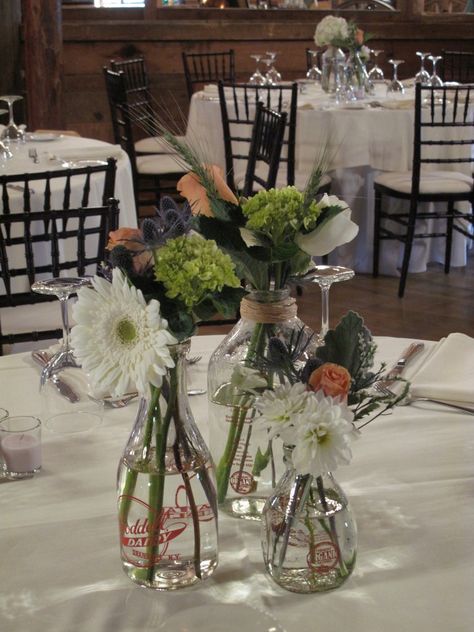 Milk bottle centerpiece for rustic, Vermont wedding by floralartvt.com Milk Bottle Centerpiece, Fall Wedding Ceremony Decorations, Centerpieces Floral, Wedding Reception Planning, Bottle Centerpieces, Country Garden Weddings, Bottle Ideas, Centerpiece Wedding, Vermont Wedding