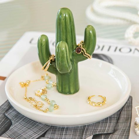 PRICES MAY VARY. Charming Ceramic Designs: Elevate your jewelry organization with our collection of ceramic ring holder dishes featuring adorable designs including cactus, aloe, elephant, flamingo, and gold deer. Each jewelry tray is meticulously crafted to bring a touch of whimsy and personality to your space. Multi-Purpose Functionality: Not just for storing rings, jewelry or keychains, these ceramic dishes double as stylish décor pieces. Whether placed on your vanity, bedside table, or desk, Cactus Ring Holder, Girls Jewelry Organization, Ceramica Artistica Ideas, Cactus Ring, Cactus Ceramic, Cactus Jewelry, Jewellery Holder, Ceramic Succulent, Jewelry Holders