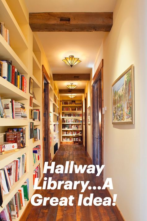 A hallway is a great place to create a library. The built in shelving and textural beams as well as ambient lighting create a rustic atmosphere. #homelibrary #hallwaylibrary #hallwaydesignideas Built In Bookshelves Doorway, Library Hallway Bookshelves, Hallway Library Ideas Narrow, Hallway With Bookshelves, Narrow Hallway Bookshelf, Narrow Hallway Shelves, Built In Hallway Shelves, Bookcase In Hallway, Narrow Hallway Bookshelves