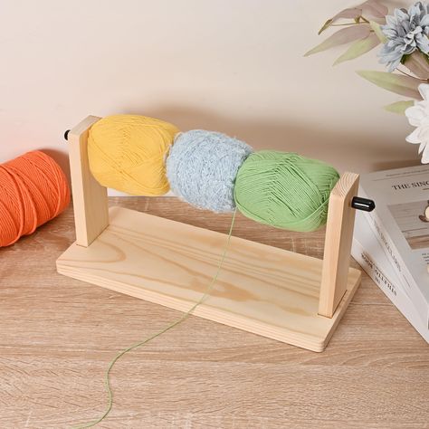 PRICES MAY VARY. 【Premium Material】Our crochet yarn holder is made of 100% premium solid wood, which is strong, steady and durable. Compared with those vertical yarn holders, the base and the side boards would keep the yarn holder standing. 【Dimension】The height of this yarn storage is 6.3" and the base is 13" x 5.1". It can hold 3 small yarn balls at the same time or a big one. 【Practical】The wooden crochet yarn holder has a good effect on prevention of yarn knotting. It helps to save time and Crochet Supply Storage, Easy Weaving Projects, Crochet Supplies Storage, Yarn Storage Ideas, Yarn Holders, Diy Yarn Holder, Crochet Yarn Holder, Knitting Organization, Side Boards