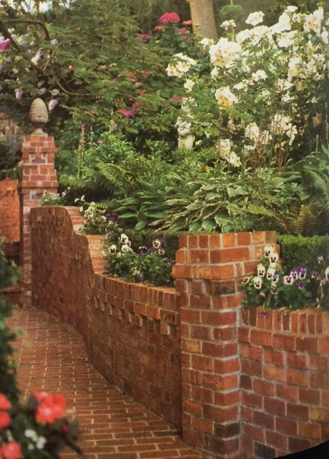 Brick retaining wall Brick Wall Landscape Ideas, Brick Landscape Wall, Garden Retention Wall, Brick Garden Design, Ivy Covered Fence, Landscaping For Brick House, Low Brick Wall Front Yard, Small Brick Wall Garden, Brick Retaining Walls