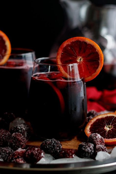 The seasonal flavors of blood oranges and blackberries come together in this simple red wine sangria. Blackberry Sangria, Red Wine Sangria, Cider Sangria, Apple Cider Sangria, Red Sangria, Orange Slice, Table Glass, Halloween Cocktails, Sangria Recipes