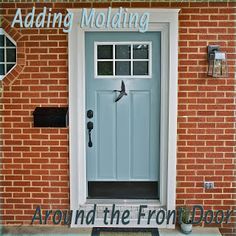 best front door colors for brick homes | Ocean Front Shack: Updating a Front Door with Molding Door Trim Ideas Moldings, Front Door Molding, Exterior Door Trim, Best Front Door Colors, Front Door Trim, Brick Columns, Best Front Doors, Blue Front Door, Orange Brick