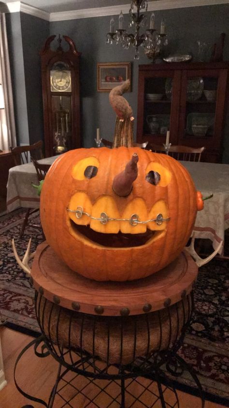 Carved pumpkin by Dental Hygienist with sweet potatoes for nose, top of soda can tab used for braces, and 2mm steel gauge wire! Happy Halloween! Soda Can Tabs, Can Tabs, Carved Pumpkin, Dental Hygienist, Soda Can, Sweet Potatoes, Braces, Pumpkin Carving, Sweet Potato