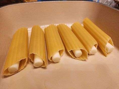 Easy Stuffed Pasta Recipes, Cheese Stuffed Pasta Recipes, Oven Baked Manicotti, Manicotti Recipes Stuffed, Easy String Cheese Manicotti Recipe, Easy Dump And Bake Manicotti, Stuffed Noodle Recipes, Tik Tok Manicotti, Cheese Stick Stuffed Pasta