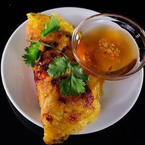 Banh Xeo (Vietnamese Shrimp Pancakes) Bahn Xeo Recipe, Pork Bahn Mi Sandwich, Shrimp Pancakes, Pork Bahn Mi, Bahn Mi Sandwich, Vietnamese Crepes, Vietnamese Shrimp, Roast Pork Loin, Spicy Sandwich