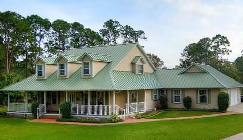 Looking for green metal roof options for your home? This light green roof creates a trendy roof design on this farmhouse. House With Brown Roof, Exterior Paint Colours, Brown Roofs, Green Roof House, Metal Roof Houses, Tan House, Best Exterior Paint, Brown Roof, Standing Seam Metal Roof