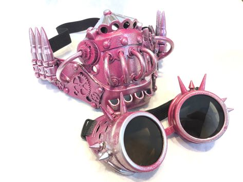 Steampunk Mask, Steampunk Gas Mask Goggles, Distressed Steampunk Respirator Gas Mask with Tubes, Spikes Steampunk embellished face mask in lightweight base with faux respirator and gears. Colored in a mix of Hot Pink/Light Pink. S H I P P I N G - Processed same day or within 24 hours. 1-2 day guaranteed delivery, add item to cart, click shipping tab for rates. Pls leave a check out note with your need date & contact number Msg for delivery time frames (Include your state/country) I N C L U D E D Pink Steampunk, Cool Gas Mask, Pink Goggles Aesthetic, Gas Mask Steampunk, Gas Mask And Goggles, Pink Gas Mask, Monster Gas Mask, Steampunk Gas Mask, Elegant Face Mask