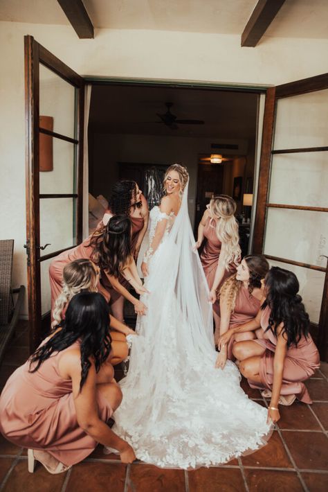 lace wedding dress, bridemaid dresses, mauve bridesmaid dresses, bridal party poses, getting ready wedding photos, bridesmaids getting ready, bridal hair & makeup, bridesmaid hair styles, wedding inspiration, mauve wedding aesthetic, temecula wedding venue, ponte winery wedding