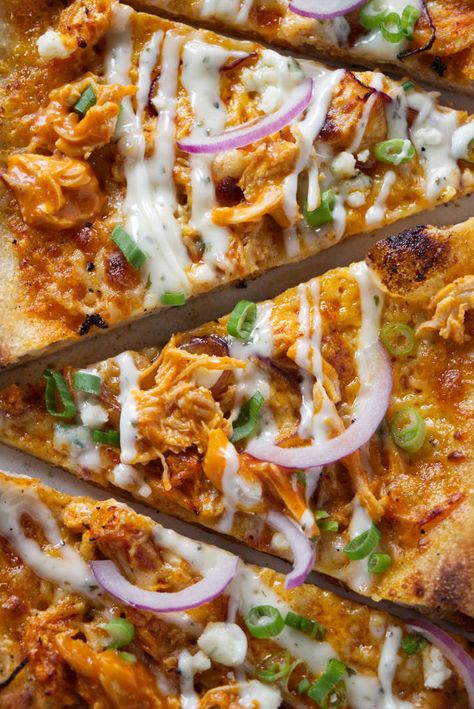 Bold buffalo flavor, three kinds of cheese and a delicious, crisp crust come together for this quick and easy homemade buffalo chicken pizza! One Pizza Dough Recipe, Keto Buffalo Chicken Pizza Recipe, Buffalo Chicken Flatbread Recipes, Fast Pizza Dough, Buffalo Chicken Pita Pizza, Ooni Buffalo Chicken Pizza, Skillet Crispy Cheese Buffalo Chicken Pizza, Buffalo Chicken Pizza Recipe, Chicken Flatbread Pizza