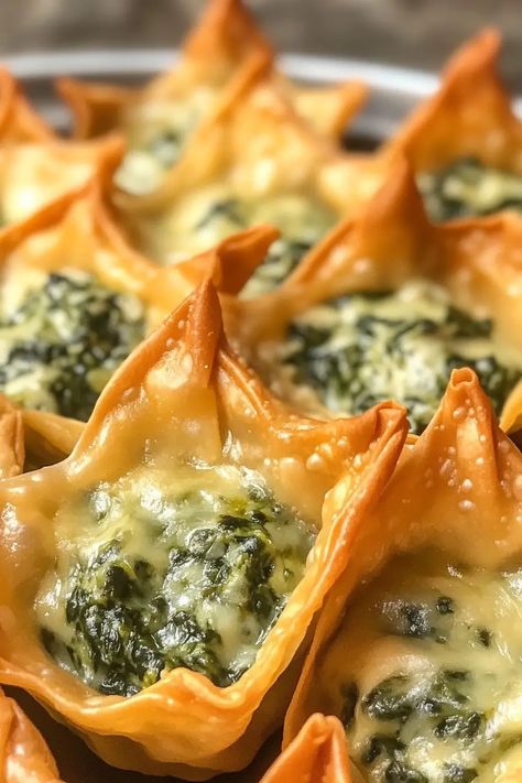 Spinach and Artichoke Wonton Cups—crispy, creamy, and perfect for parties! An easy appetizer everyone will love. Try them now! Spinach Artichoke Wonton Appetizers, Cheddar Cups With Avocado Feta Mousse, Wonton Spinach Artichoke Cups, Appetizer Recipes Spinach Artichoke, Goat Cheese Wonton Appetizers, Crispy Baked Wontons, Cranberry Wonton Cups, Spinach And Artichoke Appetizers, Spinach Artichoke Crescent Ring