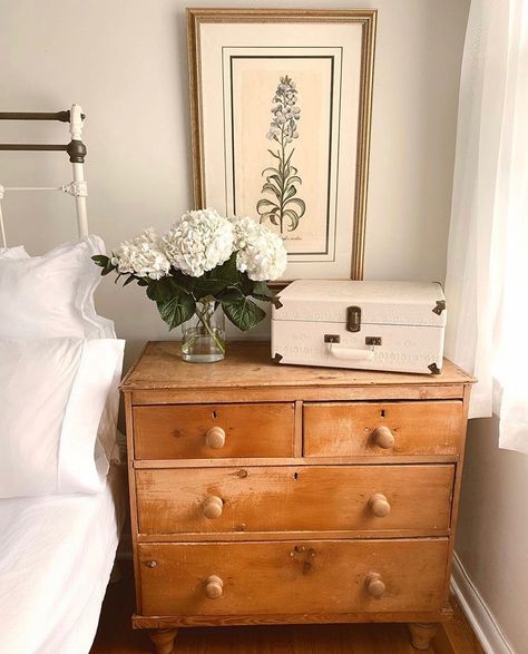 Washstand As Nightstand, Photos Above Nightstand, Dresser At End Of Bed Ideas, Tall Chest Of Drawers Bedroom Styling, Dresser Side Table Bedroom, Mixing Modern And Antique Furniture Bedroom, Post Grad Apartment Decor, Chest Of Drawers As Bedside Table, Dresser At Foot Of Bed