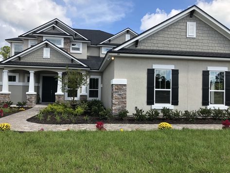 Siding And Stucco Exterior, Repose Gray Stucco Exterior, Dark Grey Stucco House Exterior, Gray Stucco House Exterior, Stucco And Stone Exterior Color Schemes, Grey Stucco House, Sw Amazing Gray, Grey Stucco House Exterior, Exterior Stucco House Colors