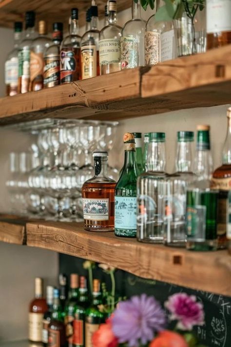 Rustic Bar Shelf Ideas for Cozy Home Pubs Wooden Bar Shelves, Rustic Bar Shelves, Modern Rustic Bar, Pub Shelves Bar Ideas, English Pub Home Bar, Diy Rustic Bar, English Pub Basement Bar, Bar Shelves Ideas, Floating Bar Shelves