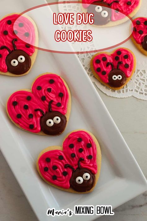 These sweet adorable love bug cookies will leave everyone bitten and smitten! Sugar cookies are decorated with frosting and so cute! Easy Valentines Snacks, Bug Cookies, Basic Sugar Cookie Recipe, Heart Shaped Sugar Cookies, Homemade Chocolate Frosting, Valentine Cookies Decorated, No Bake Sugar Cookies, Heart Sugar Cookie, Kids Plate