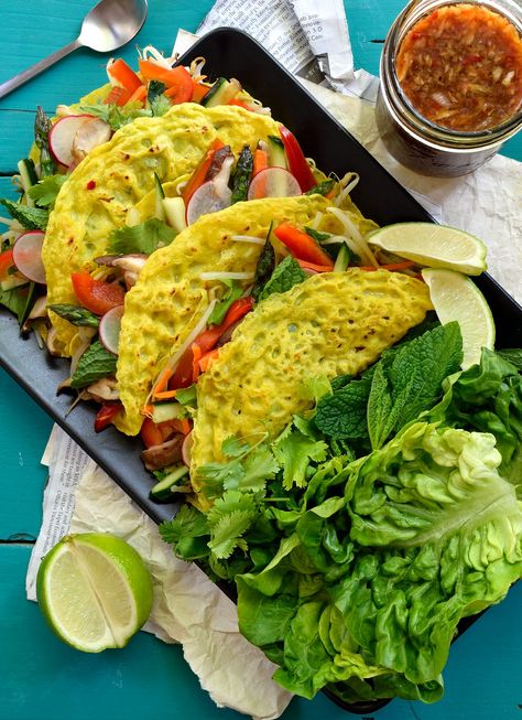 These vegan banh xeo are so simple and delicious. Crispy crepes with a sweet hint of coconut stuffed with fresh veggies and wrapped in herbs and lettuce. Vietnamese Crepes, Vegan Asian Recipes, Khmer Food, Banh Xeo, Turmeric Recipes, Vegan Asian, Crepe Recipes, Masala Chai, Vietnamese Recipes