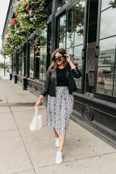 The Python Wrap Skirt ($44.90) which pairs beautifully with the The Python Cami ($34.90). Sizing is consistent with my drop, all styles are available worldwide XXS-3X and I’m wearing an XL. I styled the skirt with this black bodysuit (size L/XL, size 2X/3X available here), black moto jacket (XL, favorite faux option linked here, also XL), my favorite little white sneakers, purse and oversized sunglasses Kathleen Barnes, Snake Print Skirt, Mid Size Outfits, White Sneakers Outfit, Mid Size Fashion, Look Plus Size, The Drop, Mode Inspo, Curvy Outfits