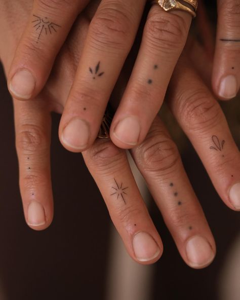 Added new elements to existing finger tattoos, each carrying a special meaning for my client. I always love working on pieces that tell a personal story - every detail holds a unique connection and brings more depth to the design. It’s incredible to see how even the smallest additions can make a tattoo so much more meaningful! #handpoke #sanfranciscotattoo #fingerstattoo Dainty Tattoos Finger, Hand Dot Tattoos, Finger Elements, Unique Finger Tattoos For Women, Hand And Finger Tattoos For Women, Hand Sparkle Tattoo, Womens Finger Tattoos, Dainty Hand Tattoos For Women, Tiny Hand Tattoos