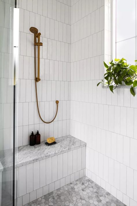 30 Stunning Shower Tile Ideas for a Standout Bathroom Shower Remodel Subway Tile, Large Subway Tile Bathroom Wall, White Bathroom Shower Tile, Stacked Marble Shower Tile, Vertical Straight Stack Shower Tile, Timeless Shower Tile Ideas, Large Subway Tile Bathroom, 12x24 Vertical Stacked Shower Tile, Tile Shower With Vertical Accent Stripe