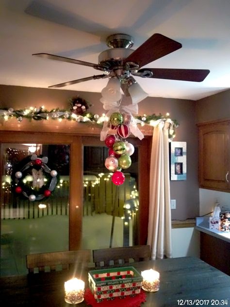 Kitchen ceiling fan decorated for Christmas Ceiling Fan Christmas Decorations, Christmas Ceiling Fan Decorations, Ceiling Fan Christmas Decor, Christmas Decor Ideas Ceiling, Party Decorations Ceiling, Christmas Chandelier Decor, Kitchen Ceiling Fan, Outdoor Candyland, Christmas Ceiling