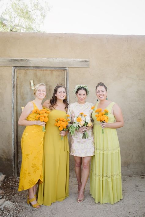 desert-inspired-wedding-style-nontraditional-Bride-Bridesmaides Short Wedding Dress With Bridesmaids, Yellow And Gold Bridesmaid Dresses, 70s Bridesmaid Dresses, Chartreuse Bridesmaids Dresses, Retro Bride Dress, Yellow Bridesmaid Dresses Mismatched, Marigold Bridesmaid Dresses, Retro Bridesmaid Dresses, Marigold Bridesmaid